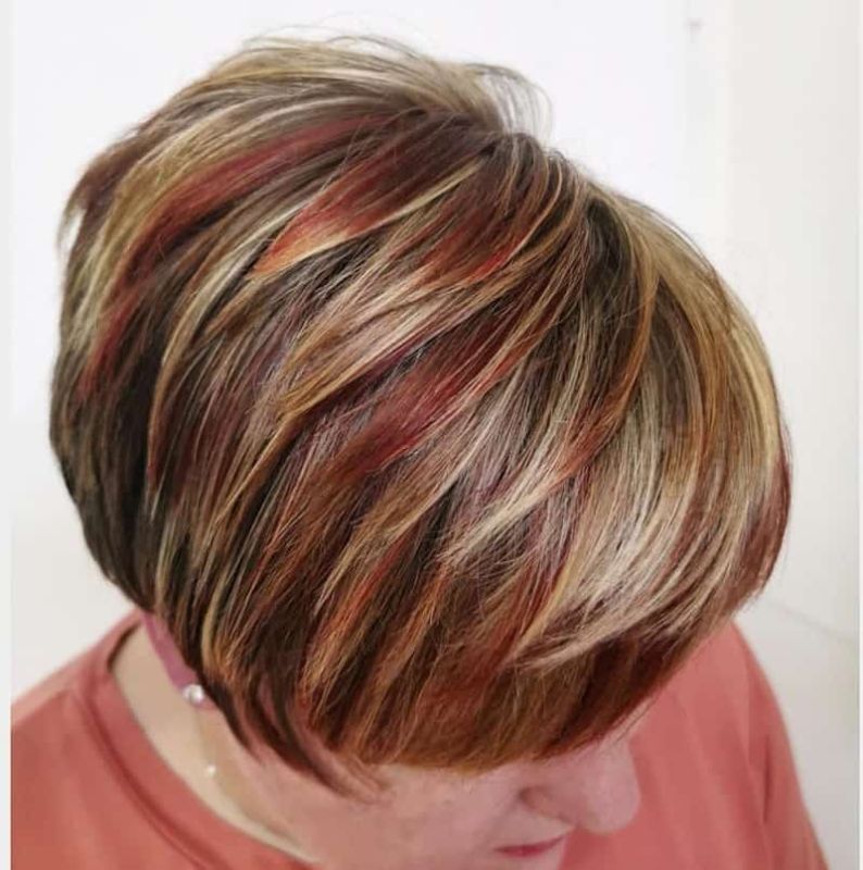red highlights on curly hair