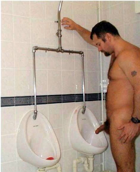 female uses stand up urinal