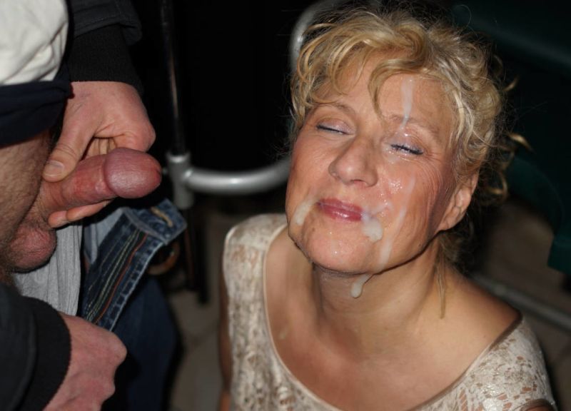 mature woman with cum on her face