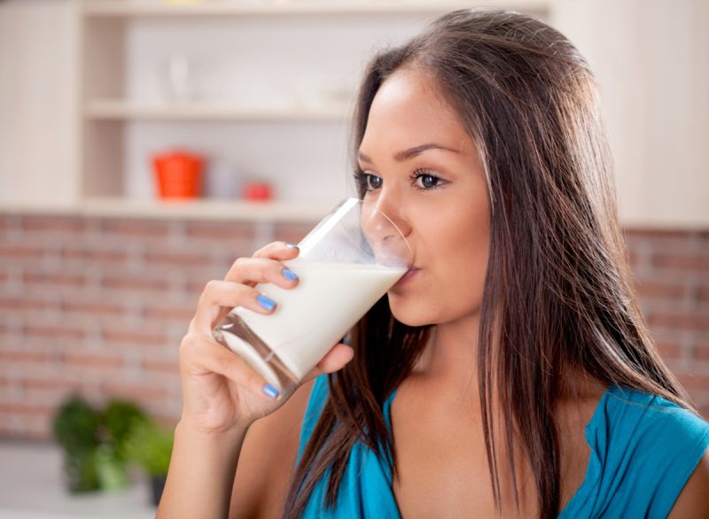 black drinking milk